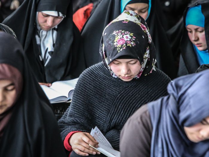 Afghan girls studying together