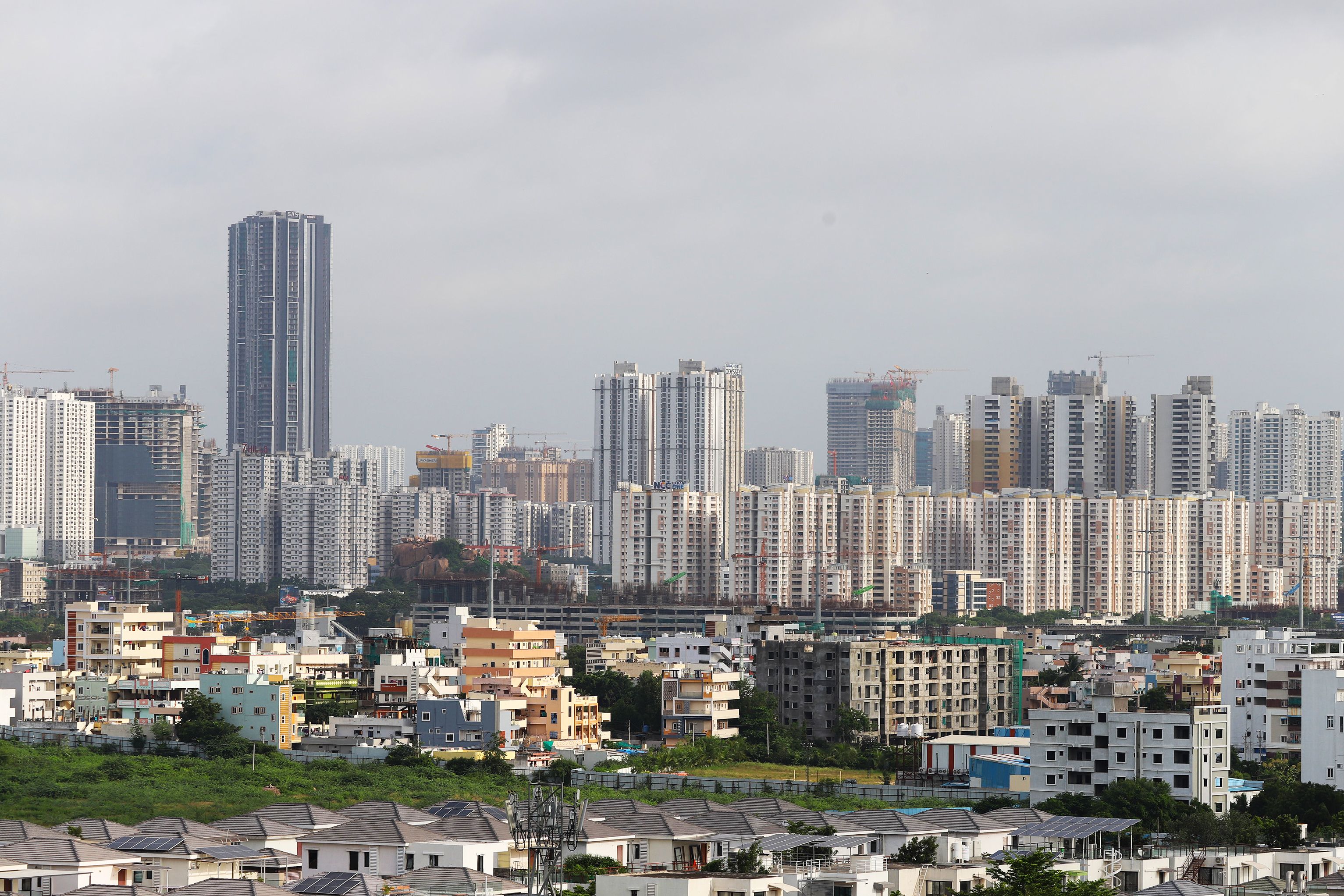 Real Estate vs. Stock Market: Which Is the Better Investment Right Now, According to Financial Experts? — Photo by Sharath G.