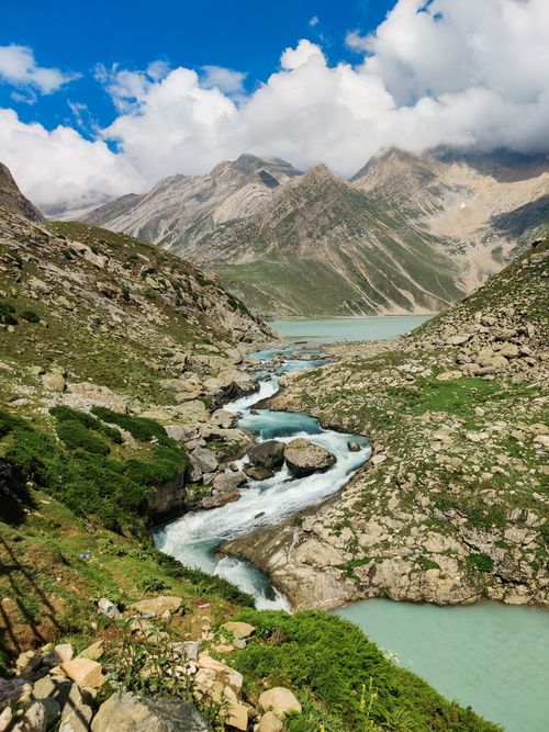 Free Beautiful alpine landscape with Zanskar River flowing through Jammu mountains under blue skies. Stock Photo