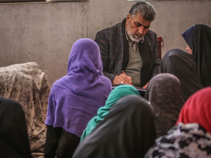 Afghan students learning in a classroom