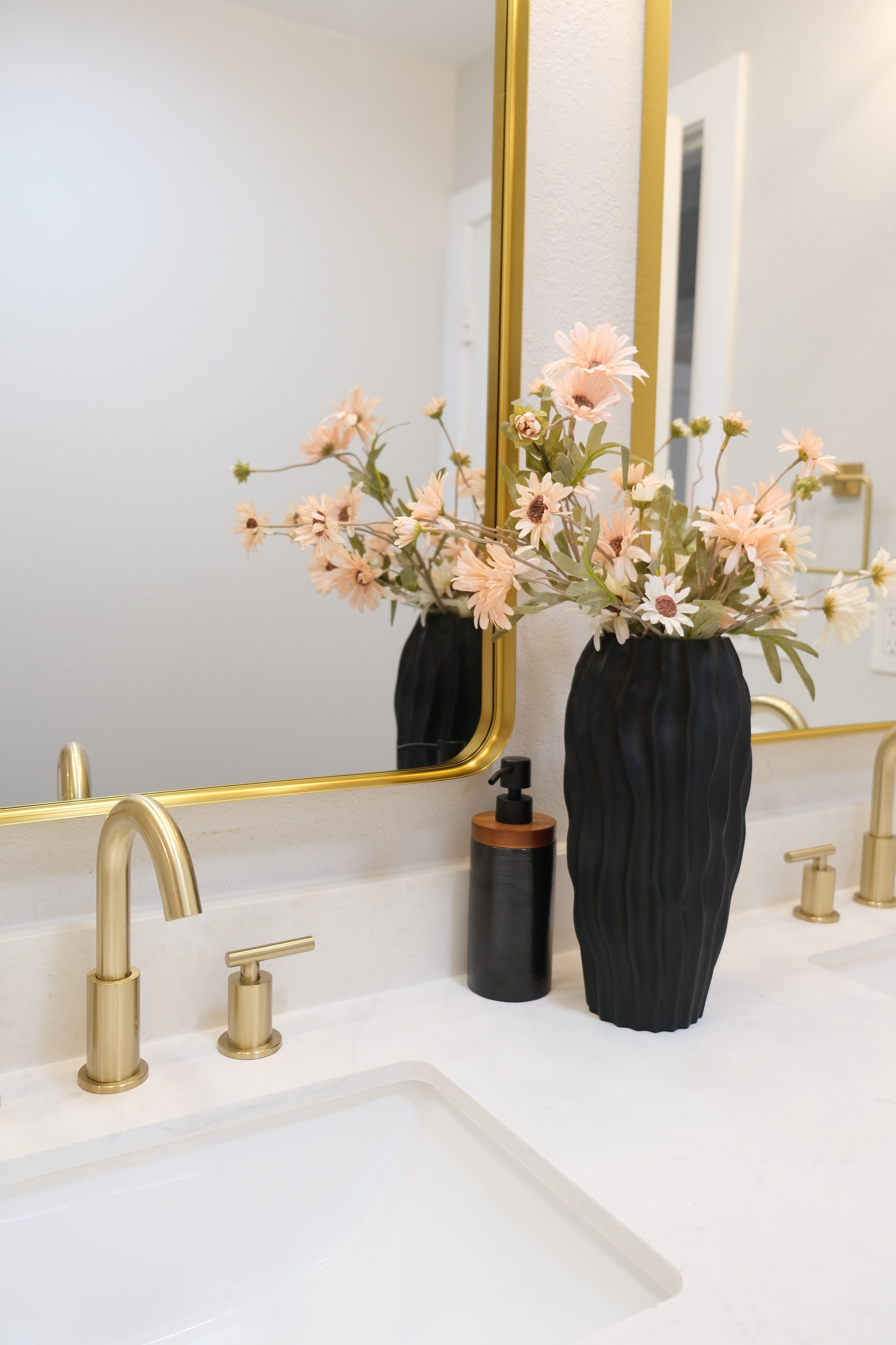 Elegant Bathroom Vanity with Flower Arrangement · Free Stock Photo