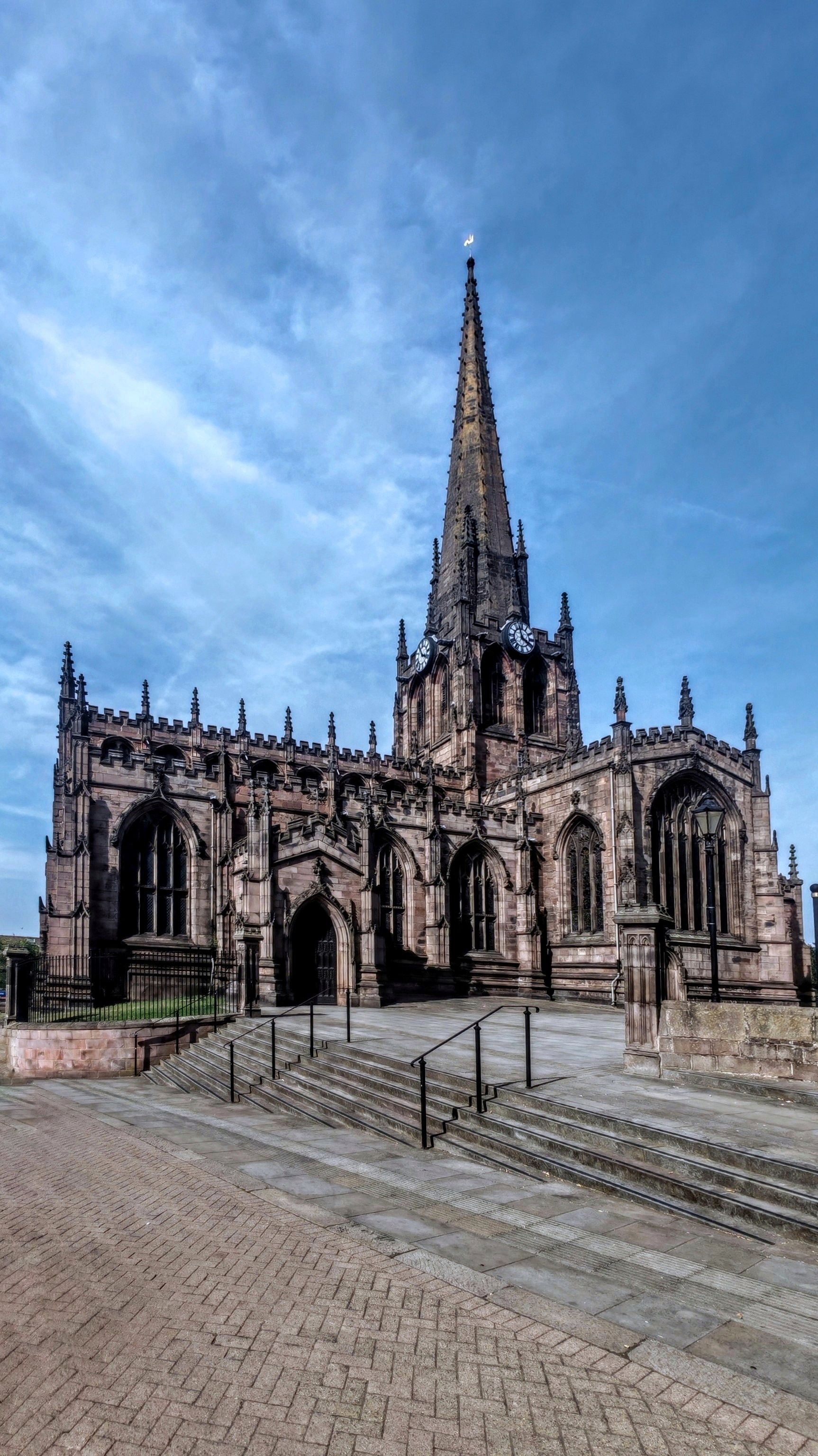 Gothic Cathedral with Tall Spire Under Clear Sky · Free Stock Photo