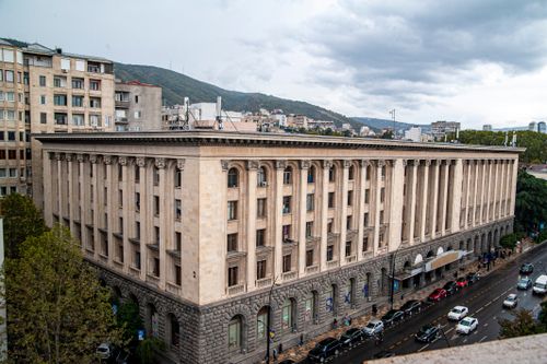 Free Aerial view showcasing a historic neoclassical building in central Tbilisi, Georgia. Stock Photo