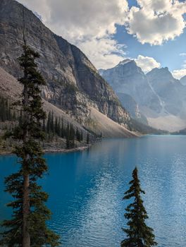 Stunning view of Moraine Lake and the rugged peaks of the Canadian Rockies on a clear day.