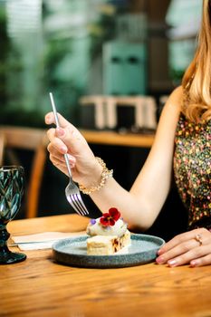 Sophisticated indoor dining with a focus on a beautifully presented dessert and elegant ambiance.