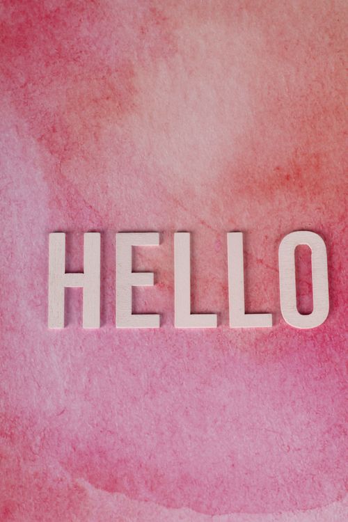 Free Pink watercolor background with 3D 'Hello' text for greeting cards or social media. Stock Photo