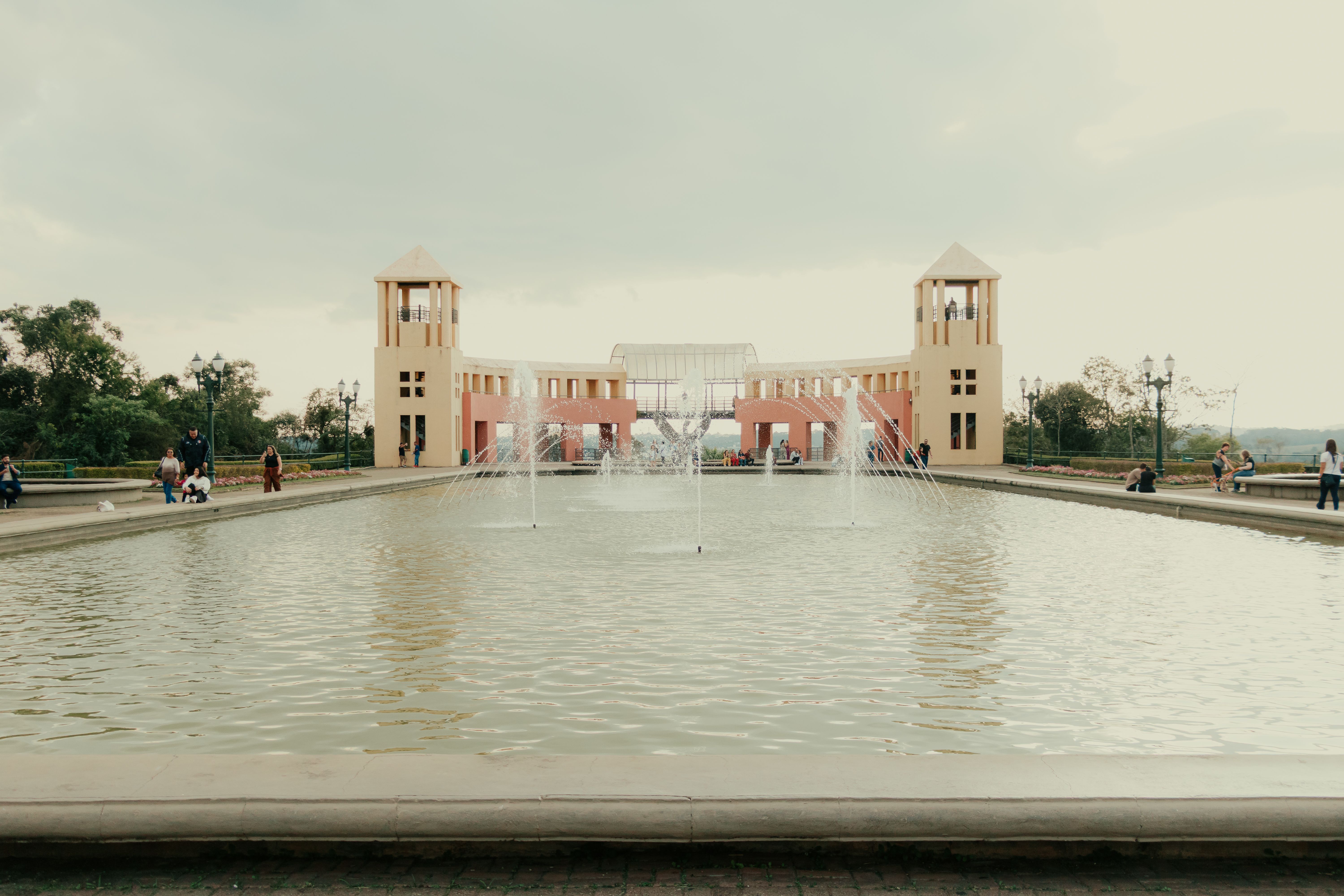Architectural landmark with fountains at Curitiba's famous park on a cloudy day.