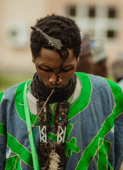 Free Person in traditional Nigerian attire with unique headdress in Zaria City, highlighting cultural heritage. Stock Photo