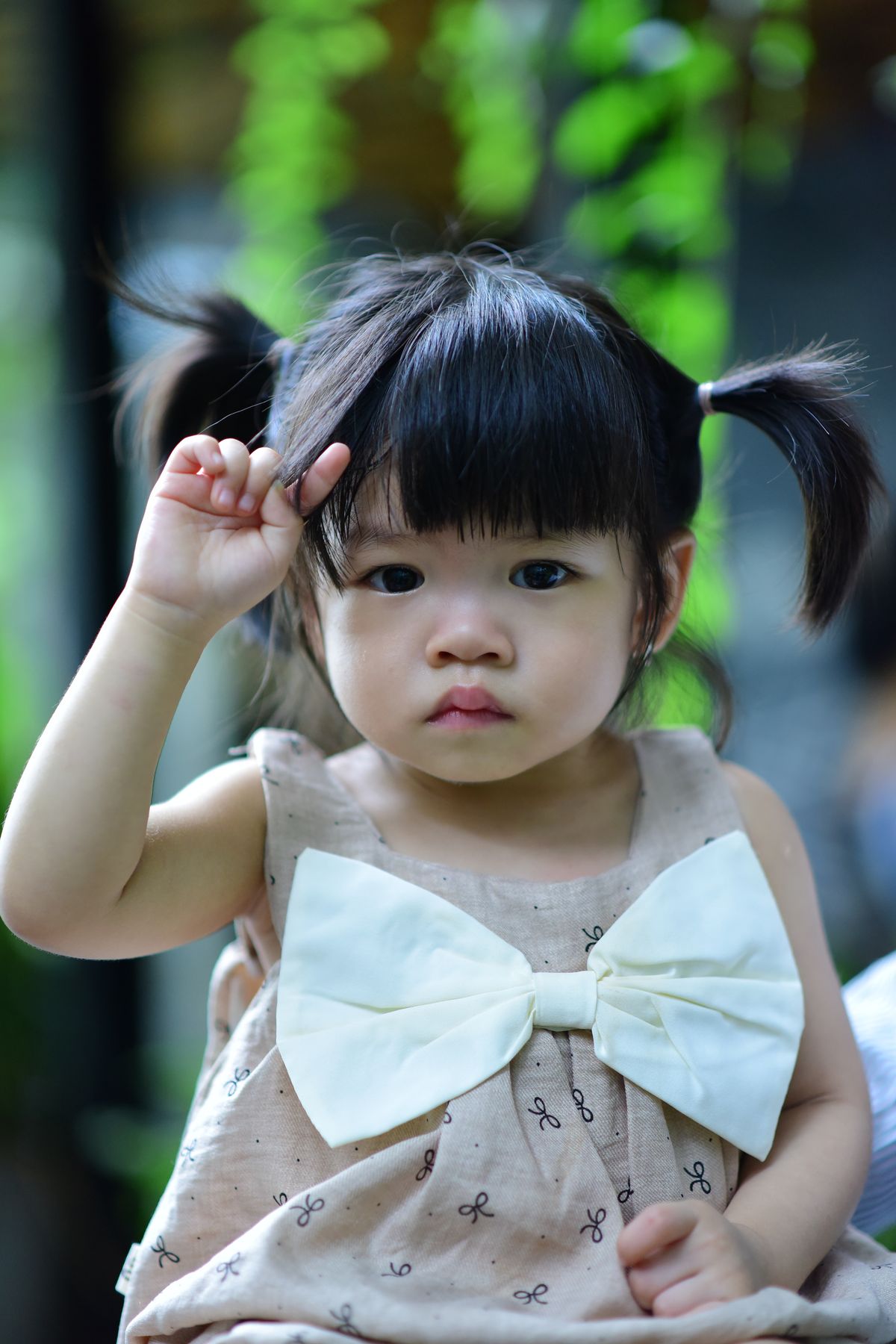 Adorable Baby Girl with Pink Bow Portrait · Free Stock Photo