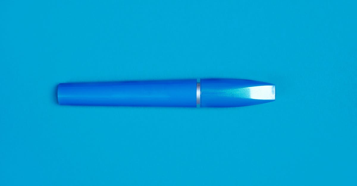 Close-Up Photo Of Blue Container · Free Stock Photo