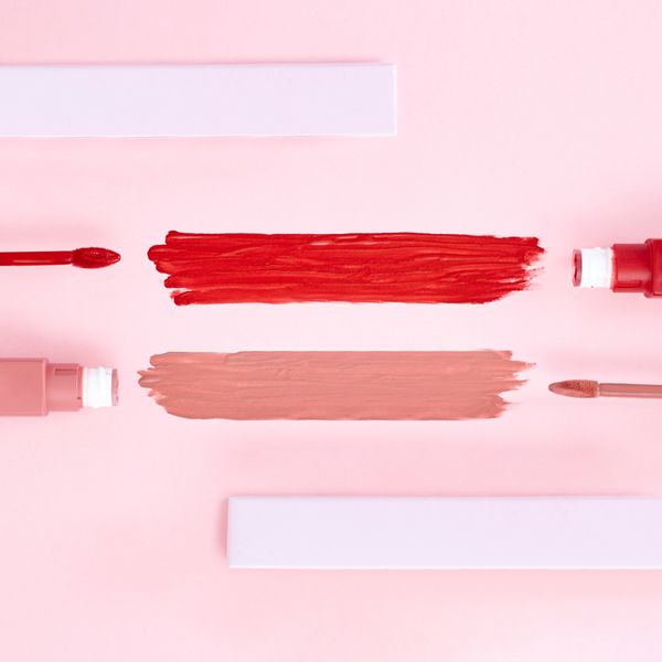 Skincare and makeup products arranged on a pale surface — photo by Shiny Diamond on Pexels