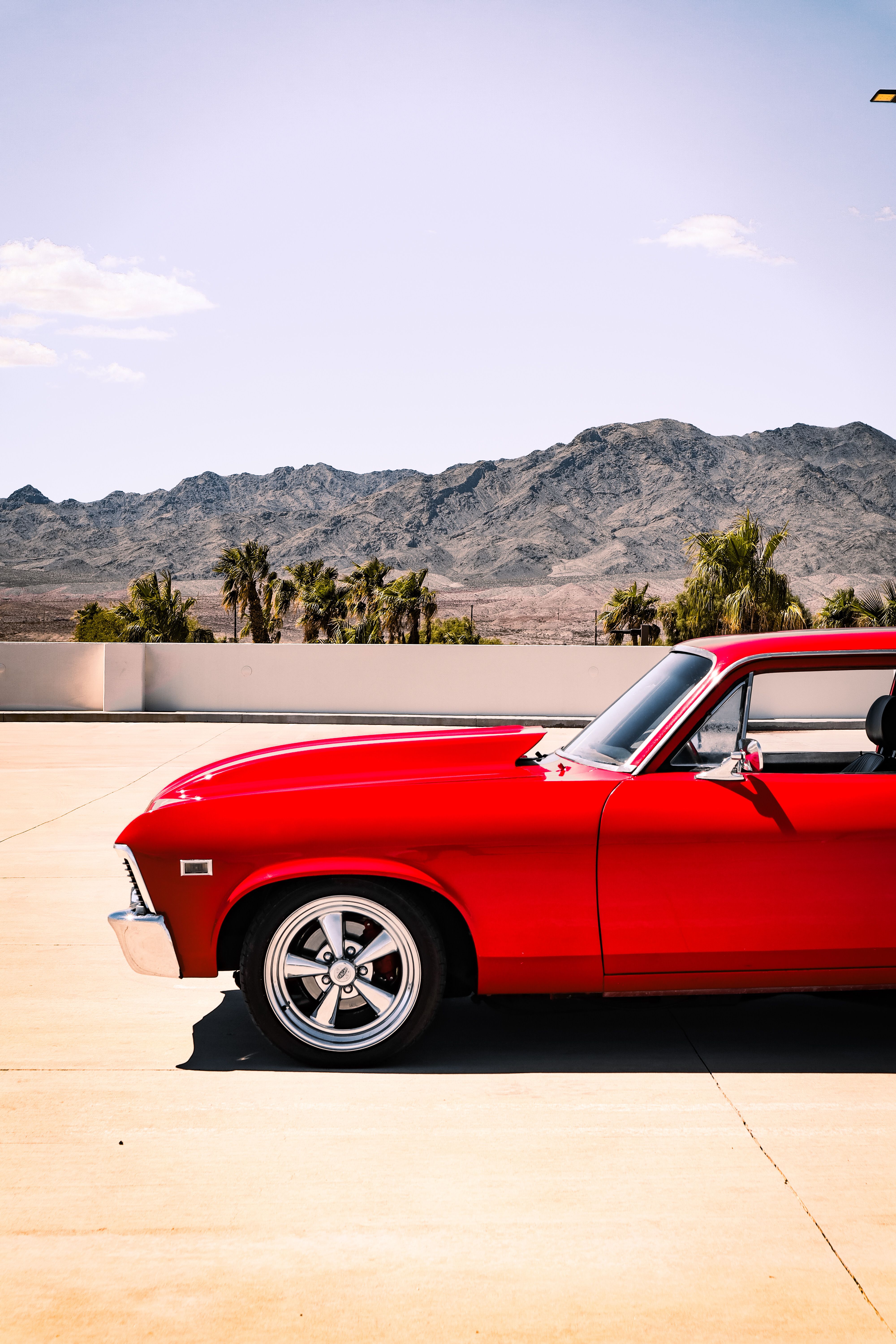 Classic Red Muscle Car on Deserted Road at Sunset · Free Stock Photo