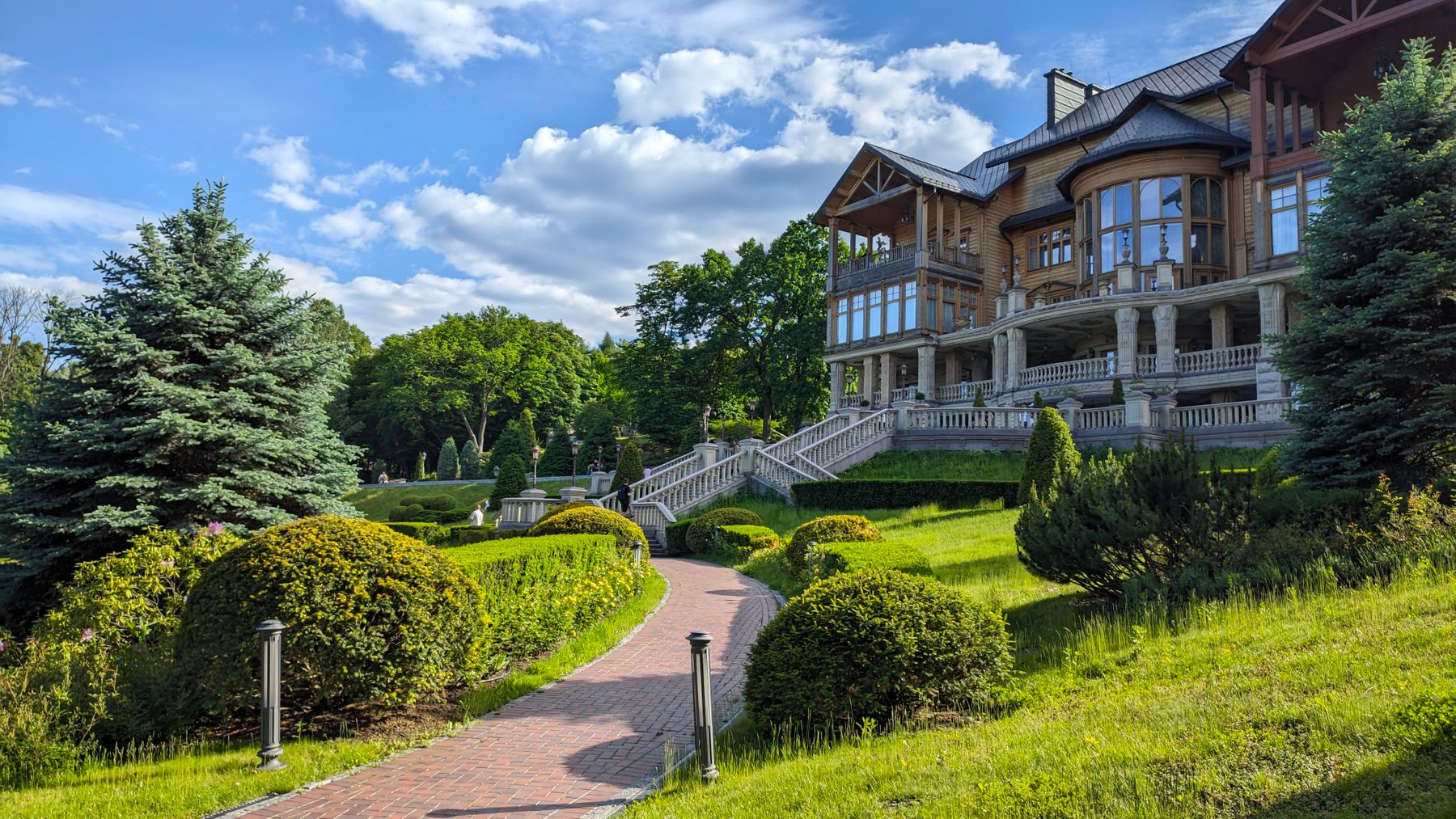 Large estate home with landscaped gardens