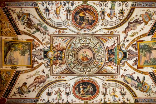 Free Exquisite Renaissance fresco featuring mythological scenes on an ornate ceiling. Stock Photo