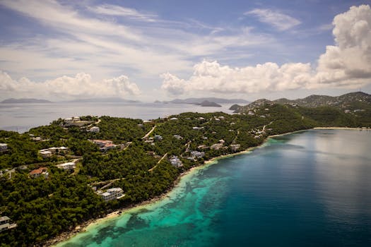 Aerial view of Northside, St Thomas with lush greenery and clear waters.