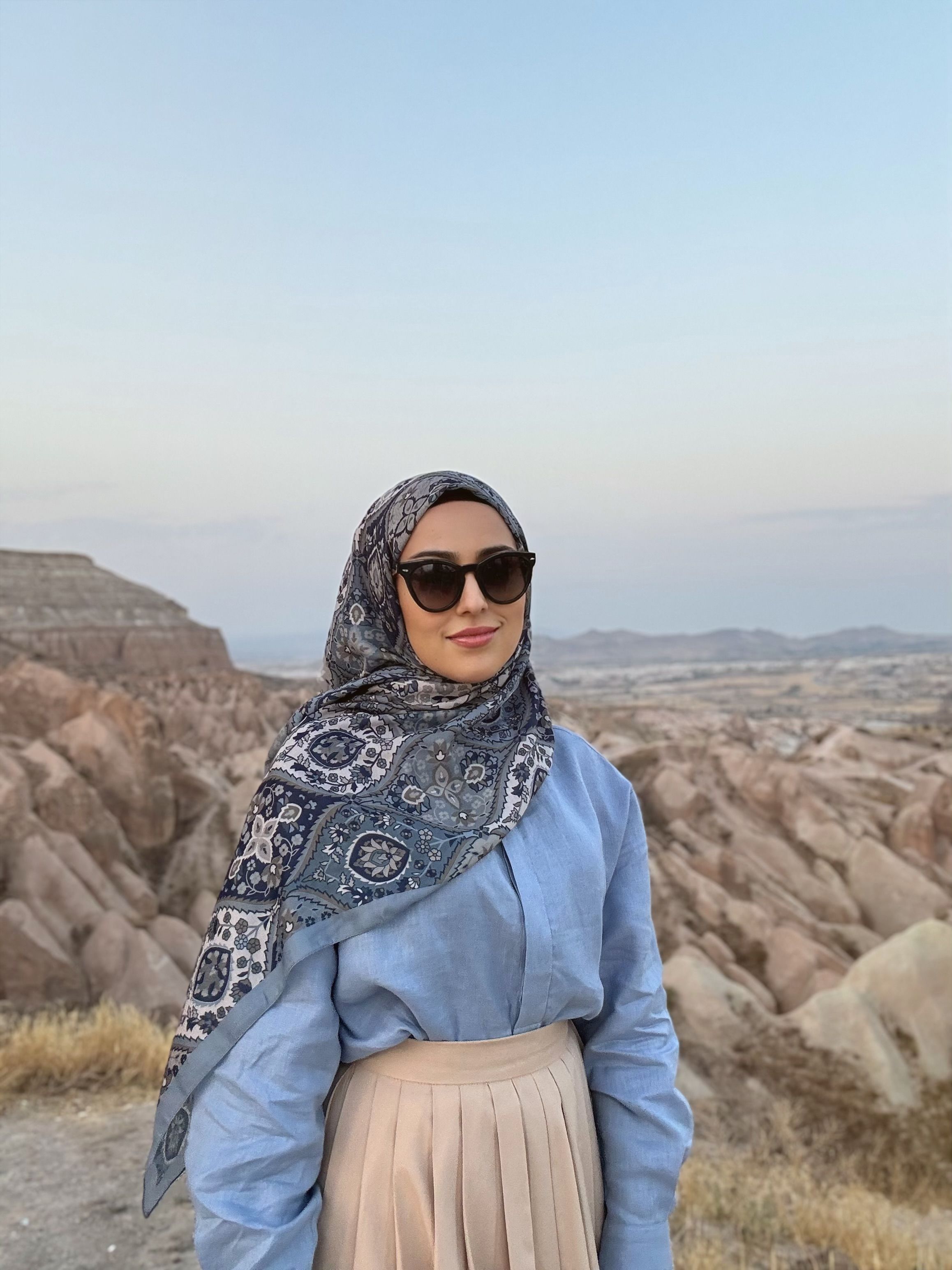 Woman in Hijab Enjoying Scenic Cappadocia · Free Stock Photo