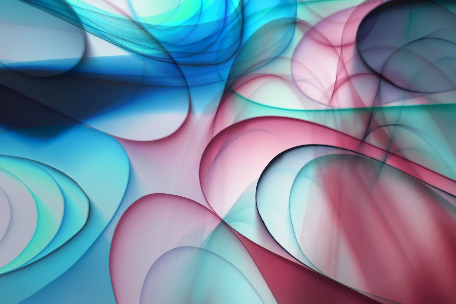 Vibrant abstract design featuring overlapping colorful shapes with soft gradients.