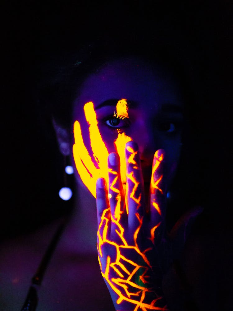 Close-Up Photo Of Woman With Face Paint