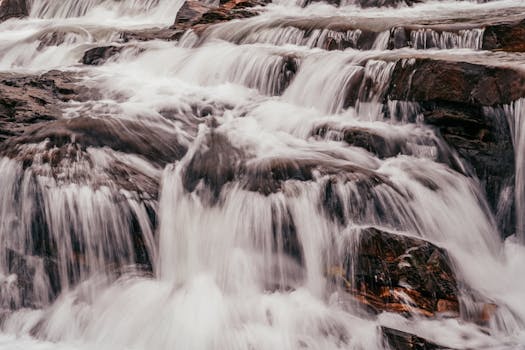 Beautiful waterfall at Kenjapahar, JH, India, showcasing nature's power and tranquility.