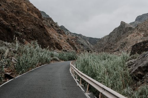 Free Explore the rugged beauty of Agulo, Canary Islands, with this moody, winding mountain road. Stock Photo