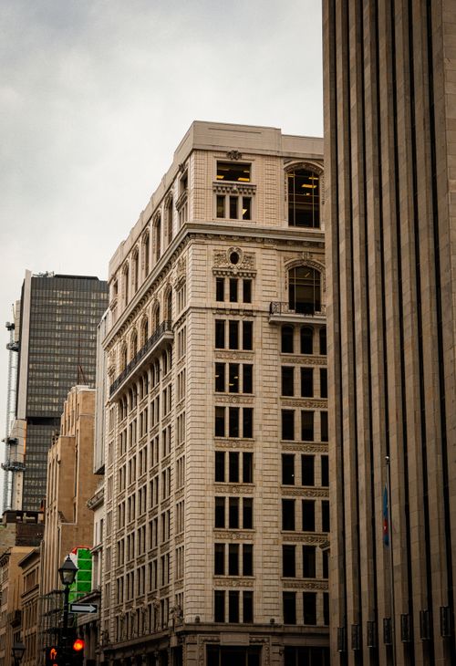 Free View of classic and modern architecture in downtown Montreal, capturing the city's urban landscape. Stock Photo
