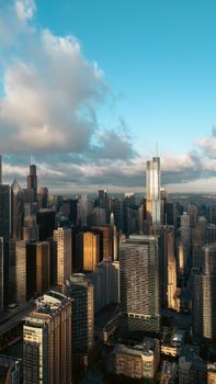 Stunning aerial view of Chicago's skyscrapers under a bright blue sky.