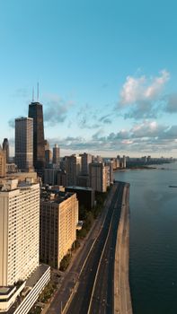 Stunning aerial view of Chicago's skyline along Lake Michigan during sunrise.