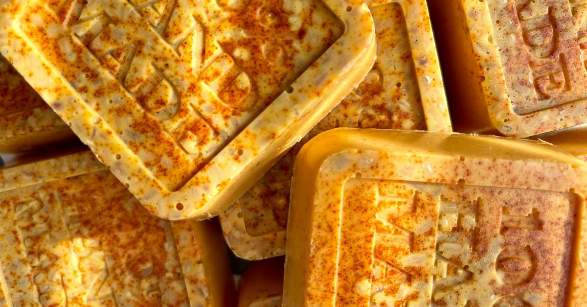 Close-up of beautifully crafted handmade soap bars showcasing natural textures and vibrant hues. - Evidence evidence guide for turmeric skin hydration randomized trial