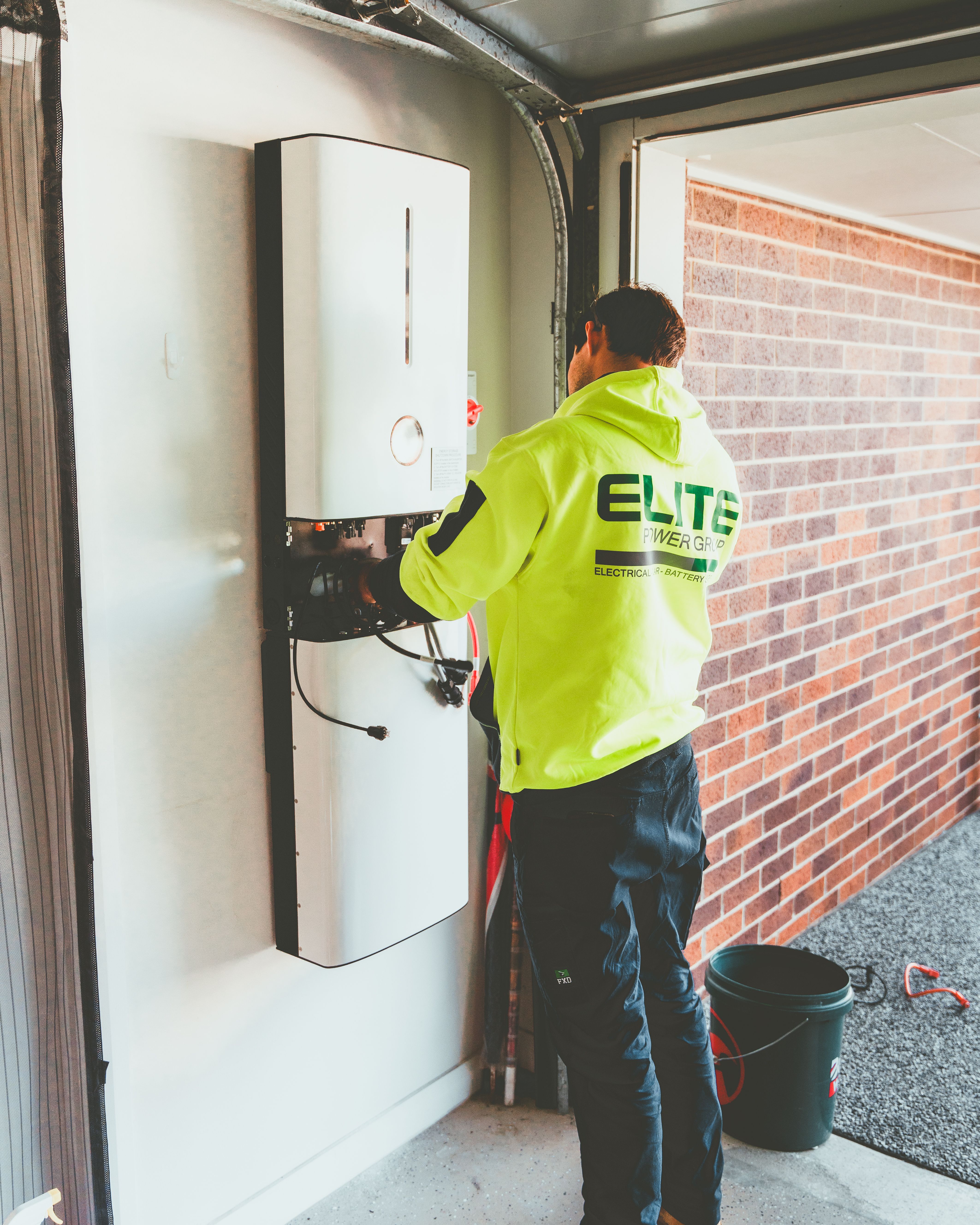 Electrician working on panel