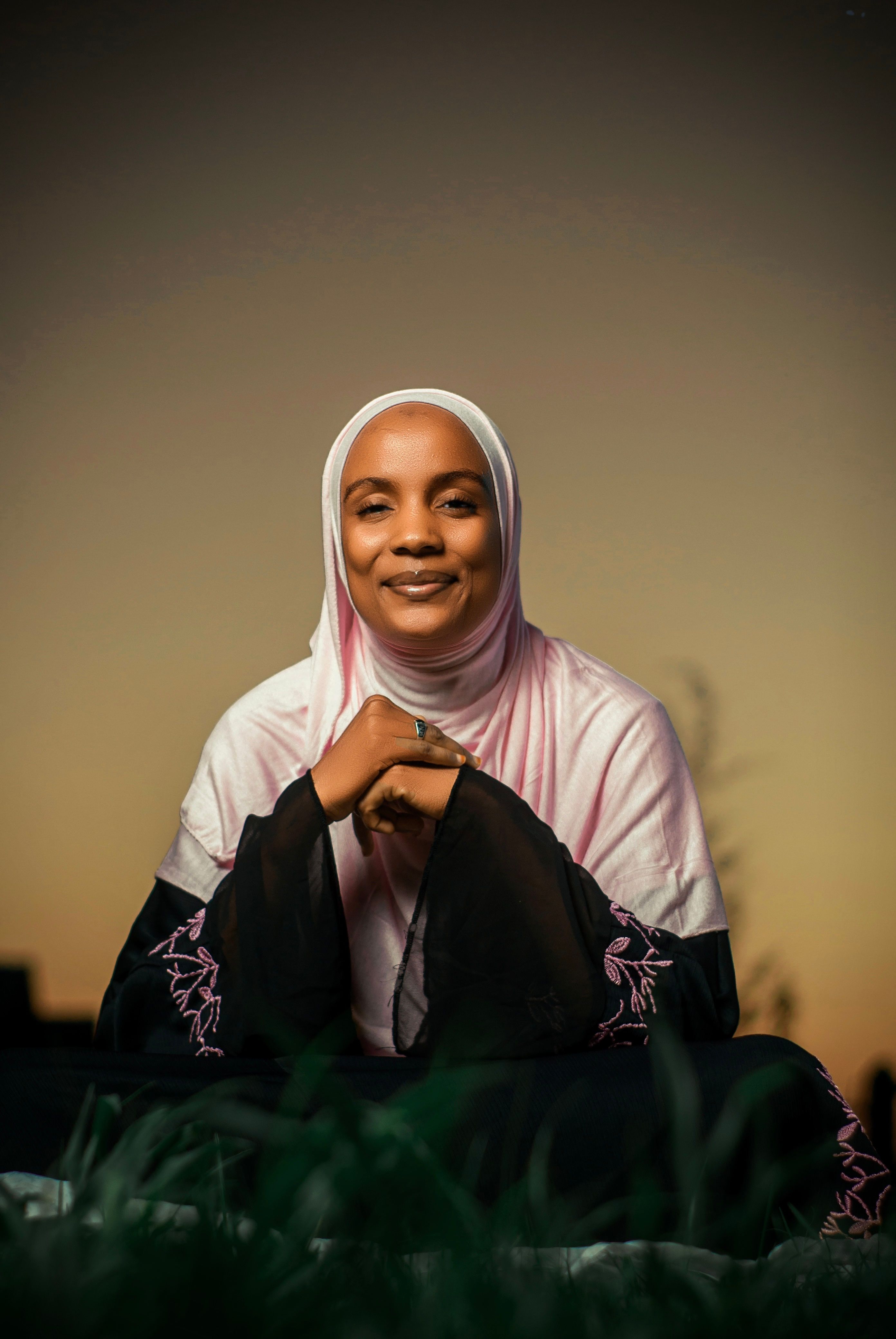 Portrait of Smiling Woman in Pink Hijab at Sunset · Free Stock Photo