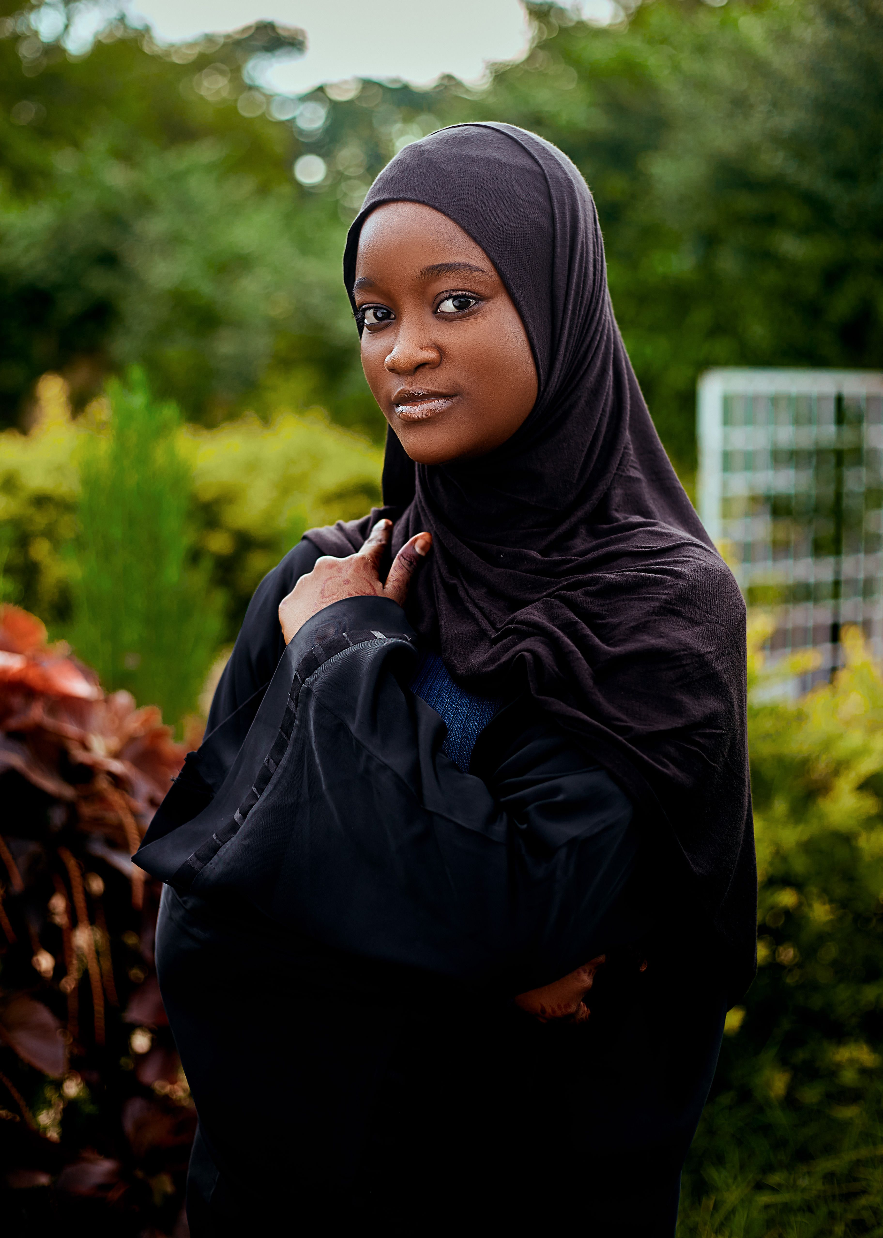 Portrait of a Woman in Black Hijab Outdoors · Free Stock Photo