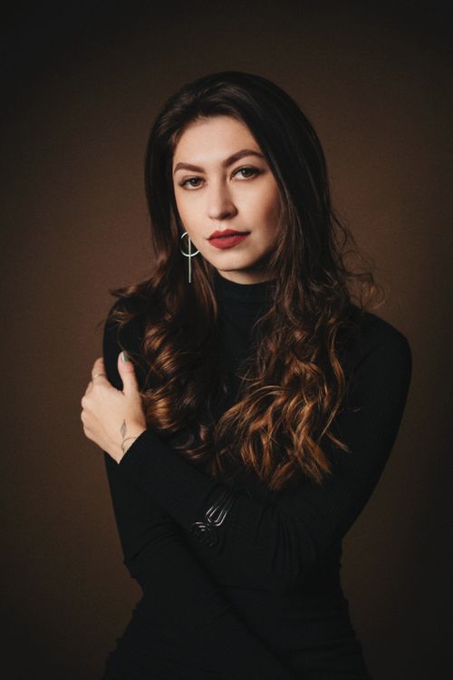 Elegant Portrait of a Woman with Long Hair · Free Stock Photo