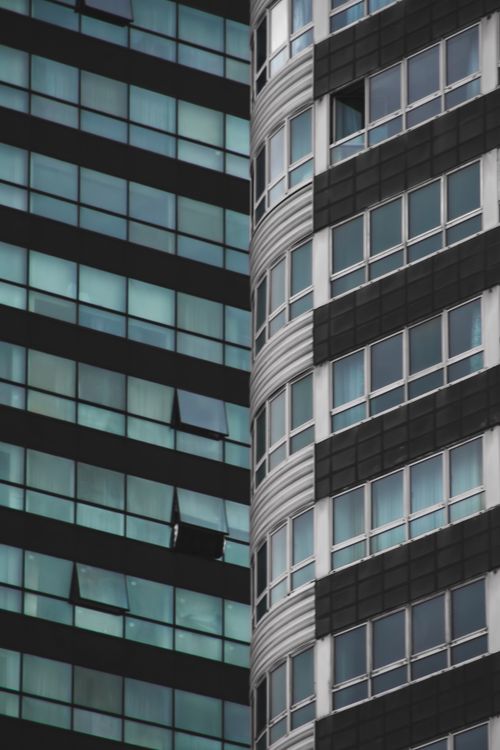 Free Close-up of modern high-rise building facades in Oran, showcasing architectural designs. Stock Photo