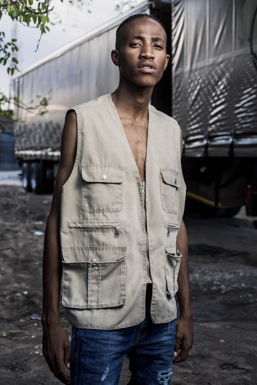 Free Photo Of Man Wearing Grey Vest Stock Photo