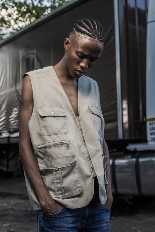 Free Photo Of Man Wearing Grey Vest Stock Photo