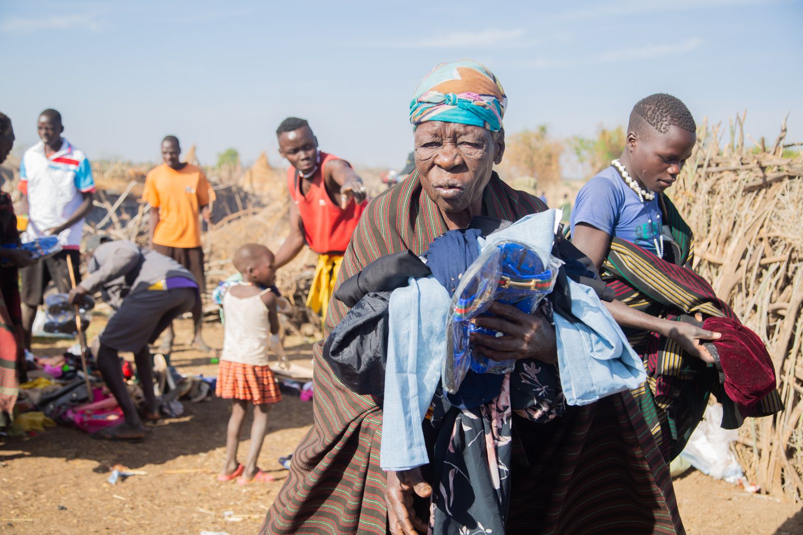 People gathered at a vibrant African market