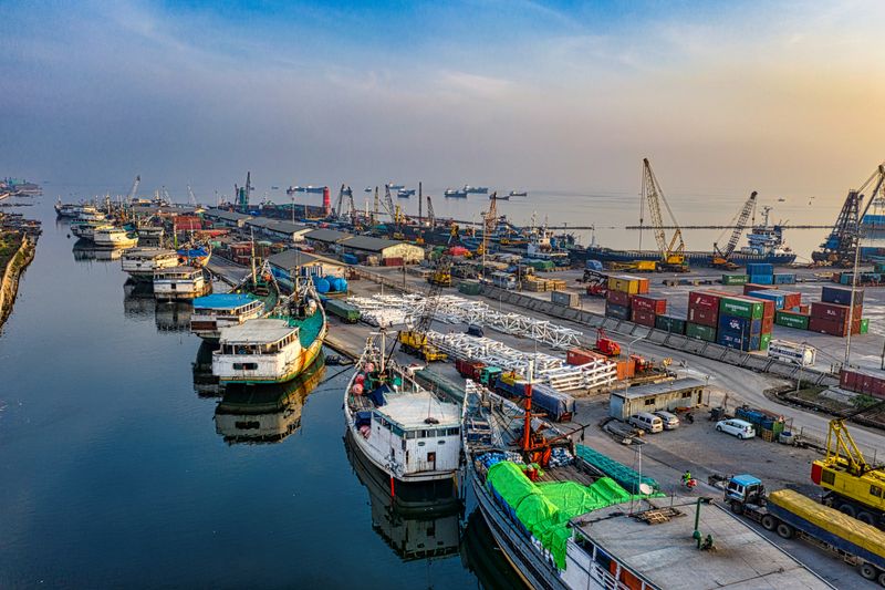 Container terminal glowing at dusk