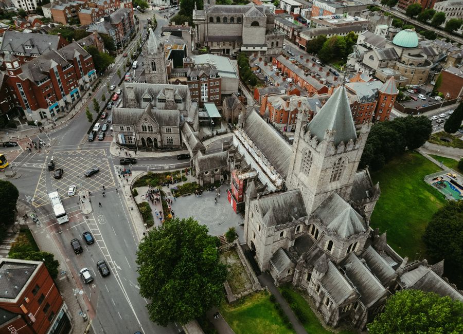 Stunning aerial shot of Dublin's Christ Church Cathedral, highlighting medieval architecture and cityscape.