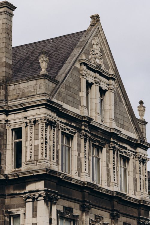 Free Close-up of a Gothic Revival style building in Dublin, showcasing intricate stonework. Stock Photo