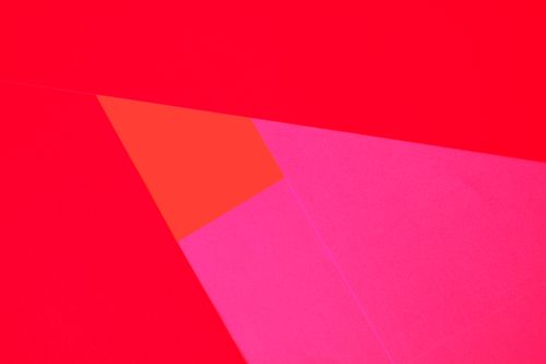 Free Bright abstract art with vibrant geometric shapes on colored paper. Stock Photo