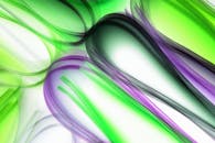 Vibrant Abstract Light Streaks in Green and Purple