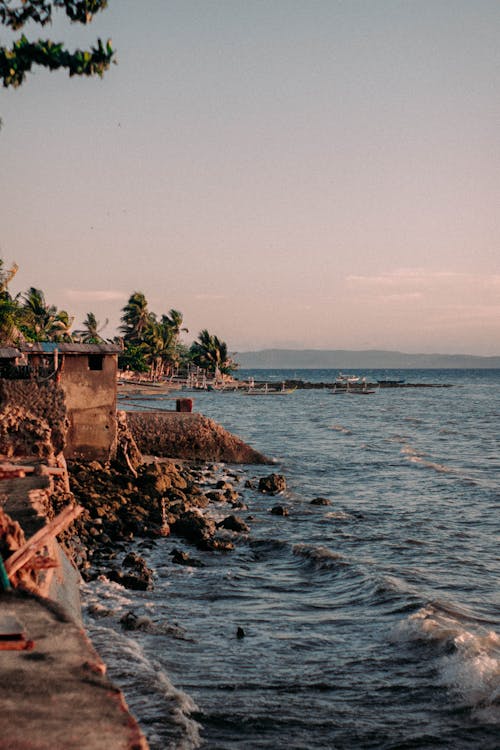 Бесплатное стоковое фото с бедный, безмятежный, берег моря