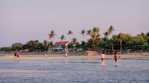 Tropical resort with sandy beach and rippling sea