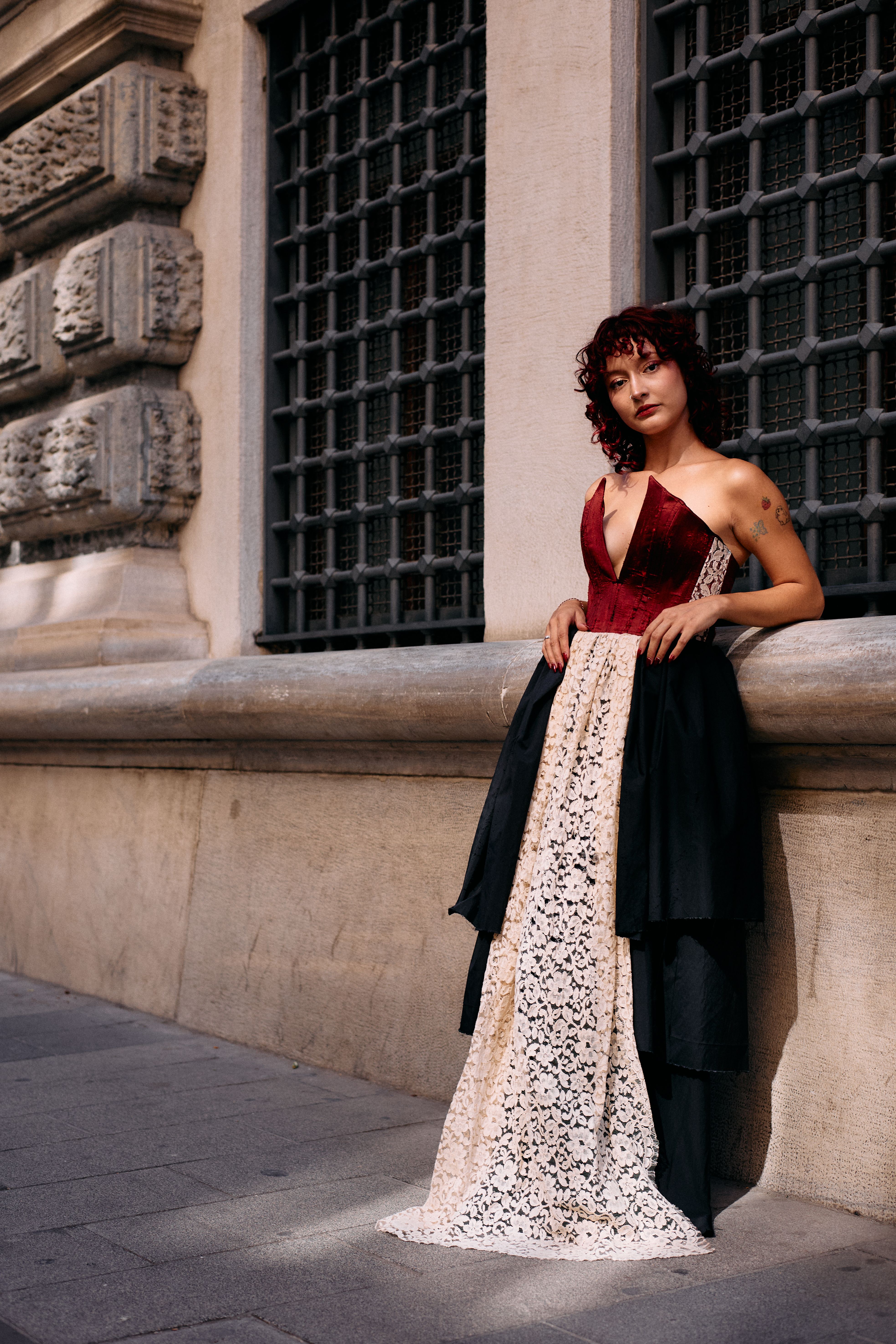 Stylish Woman Posing by Historic Istanbul Wall