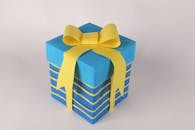 Vibrant Blue Gift Box with Yellow Ribbon
