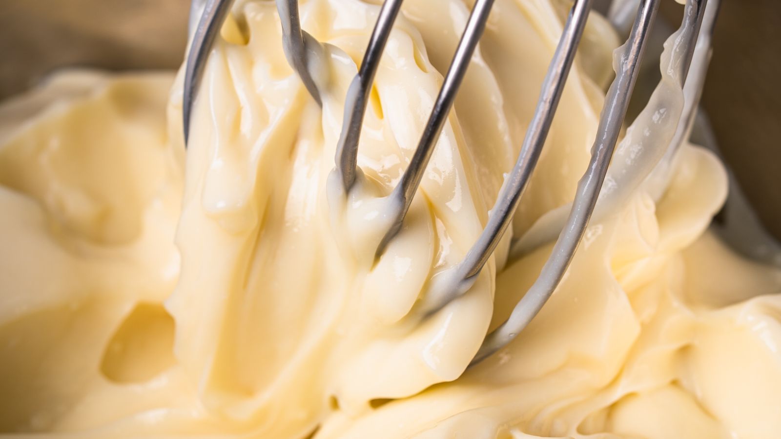 Homemade mayonnaise being whisked in a metal bowl — photo by Nano Erdozain on Pexels Homemade mayonnaise being whisked in a metal bowl