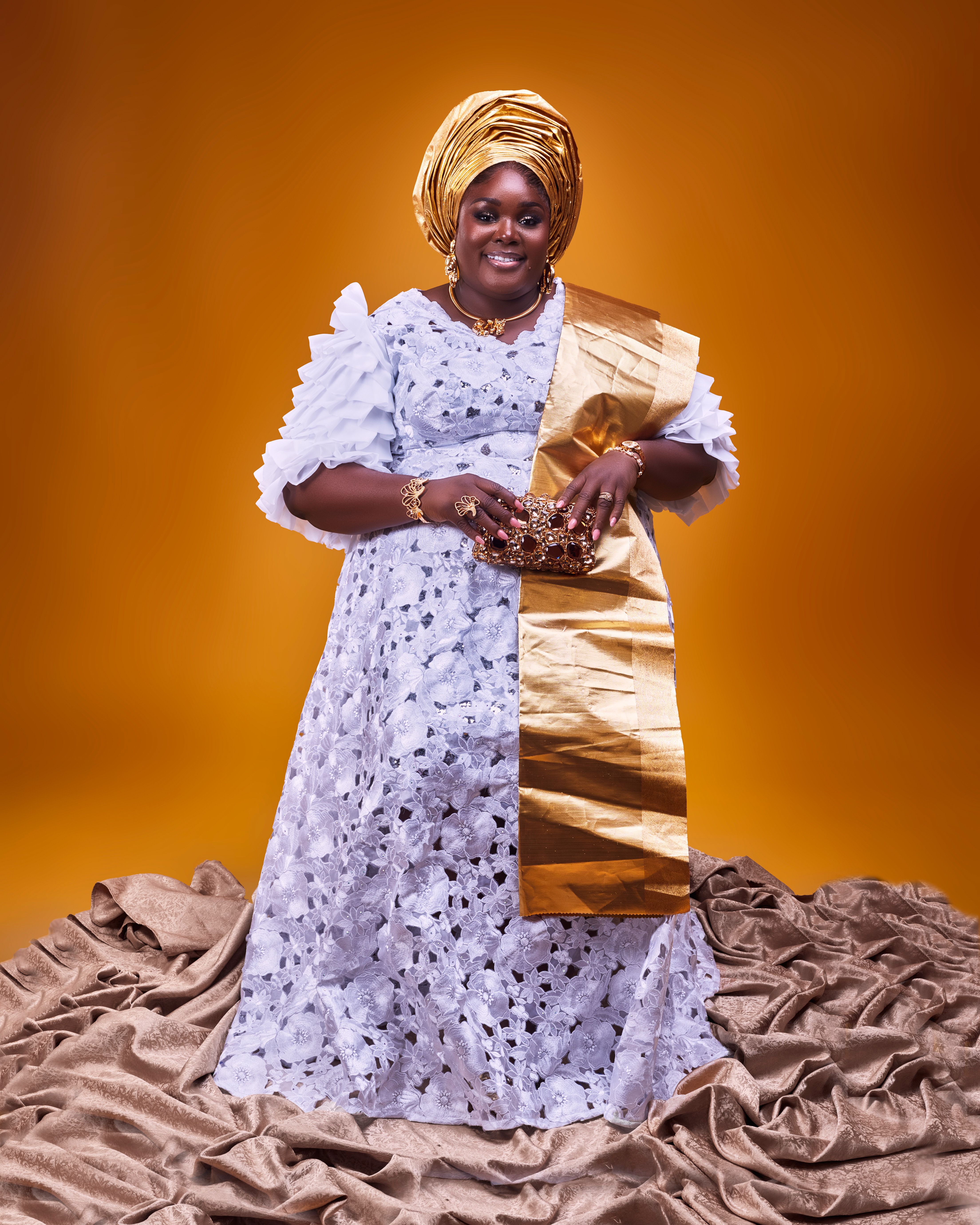 Portrait of an African woman in vibrant traditional attire, exuding elegance and culture.