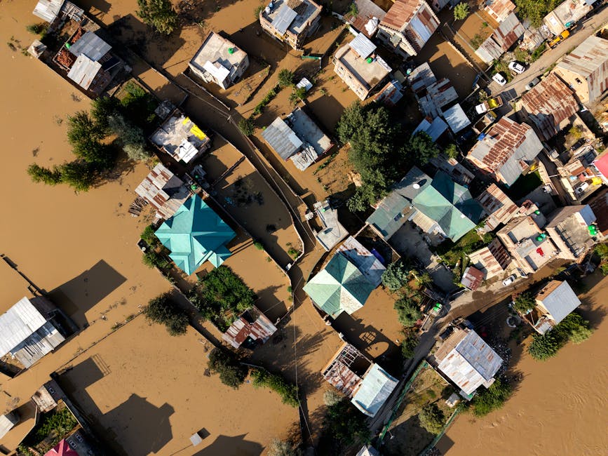 Drone photo capturing flooding in a residential area in Kashmir. - Kashmir community resilience