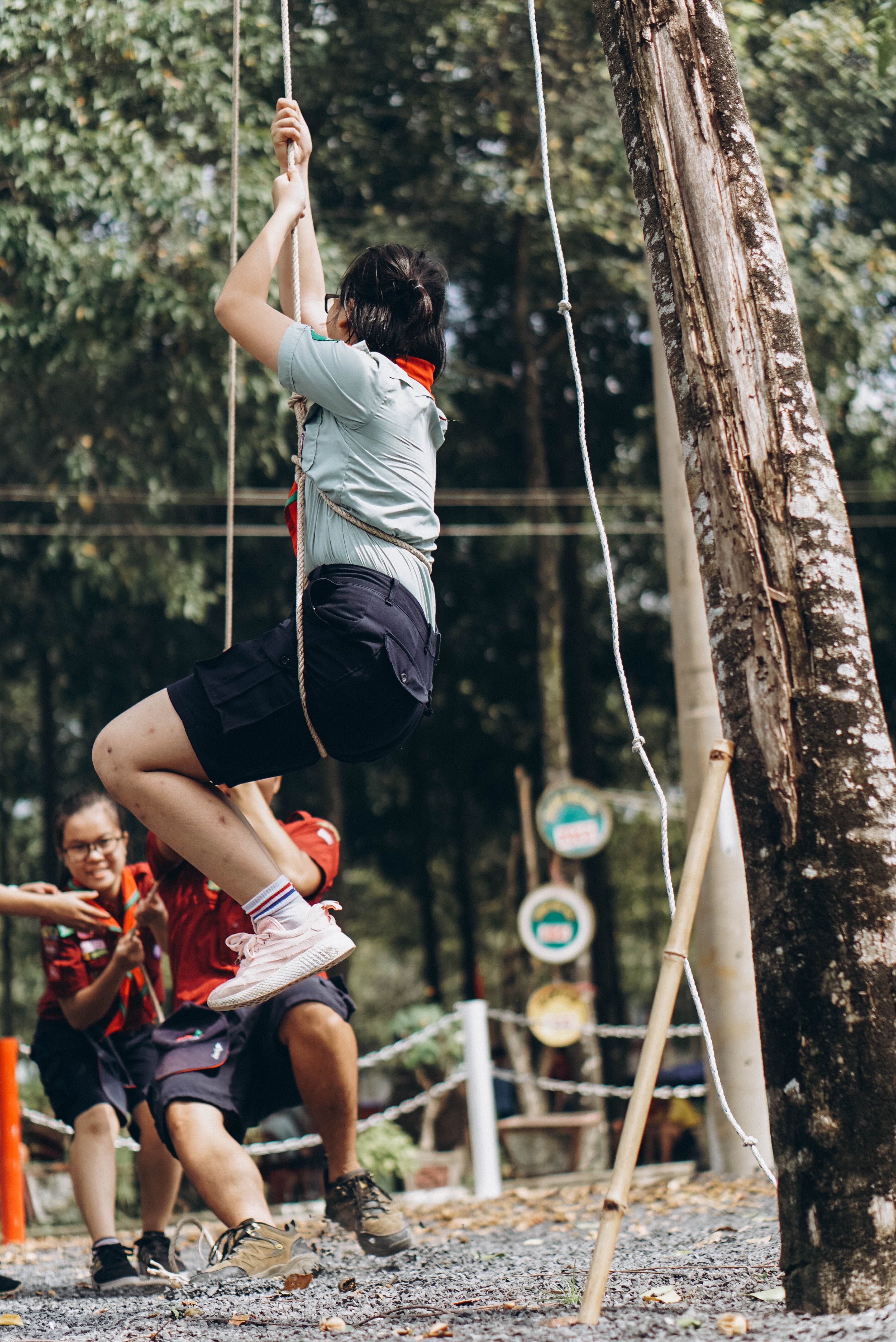 Youth Engaged in Outdoor Ropes Activity · Free Stock Photo