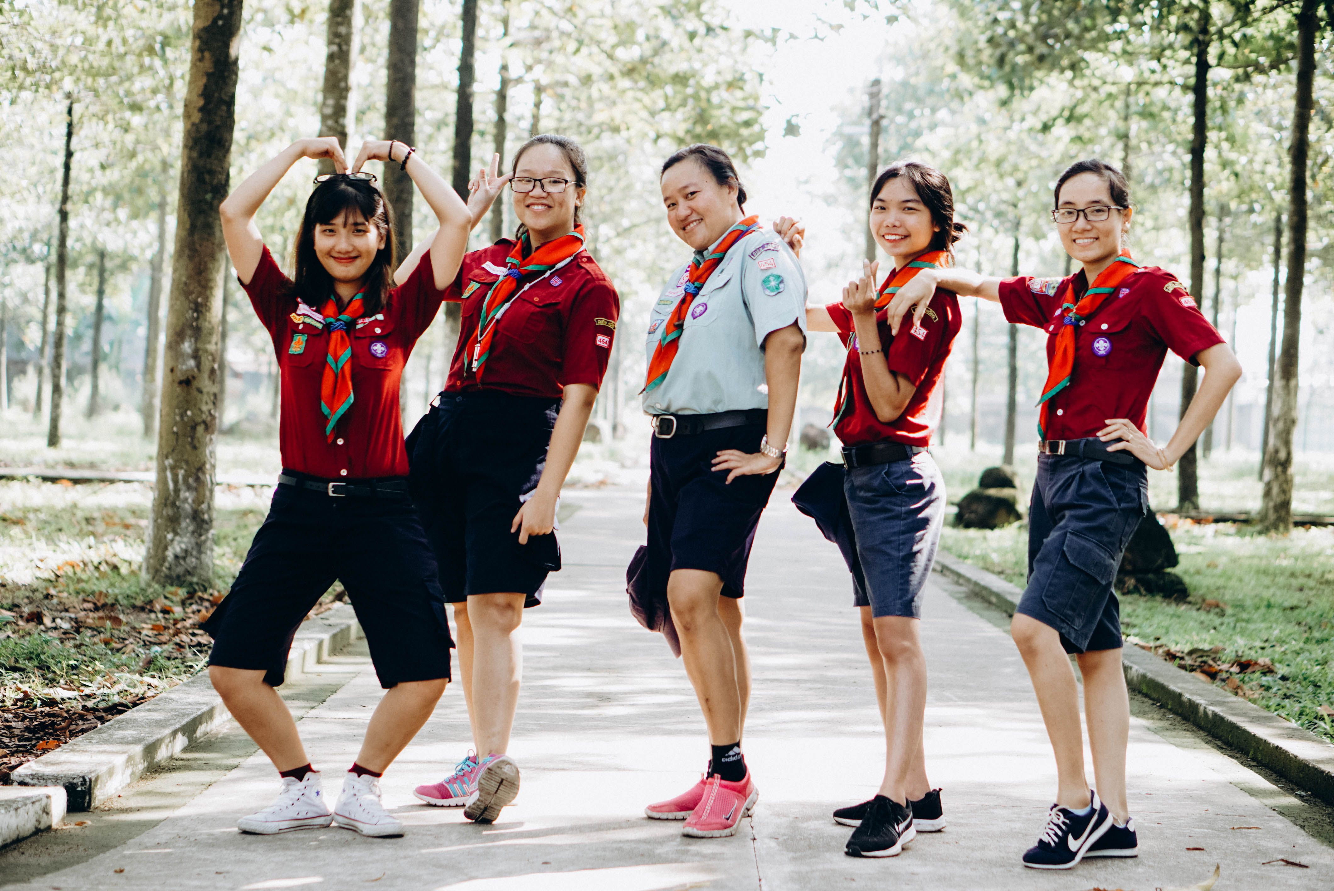 Group of Cheerful Scouts Posing Outdoors · Free Stock Photo
